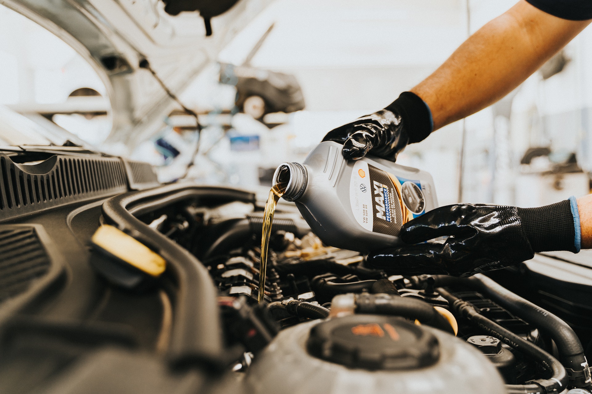 man working on engine at Major World long island city service department