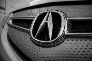 Acura Badge on Vehicle Grill - Acura vs. Lexus concept image