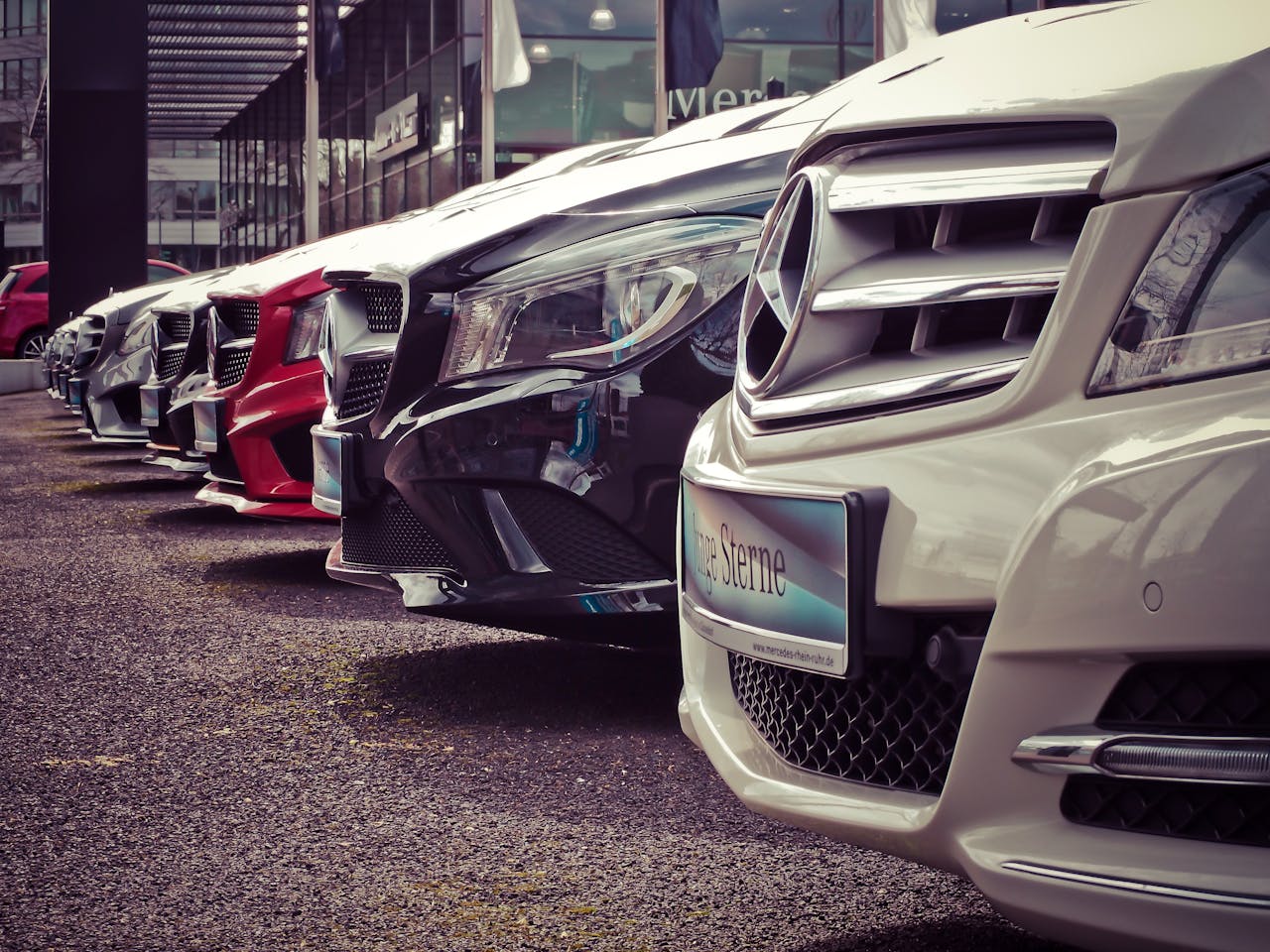 pexels-pixabay-164634 mercedes benz parked in a row