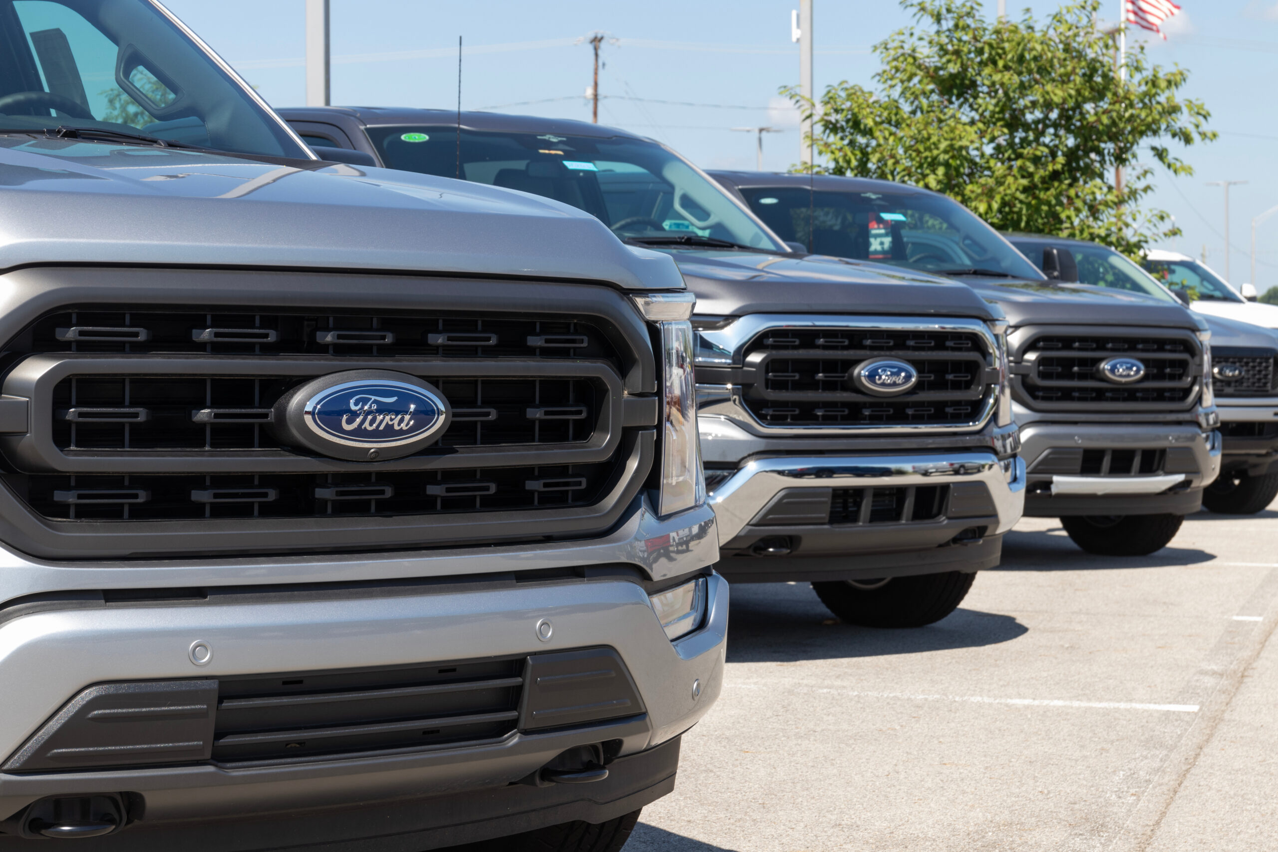 Muncie – July 10, 2023: Ford F-150 display at a dealership. The Ford F150 is available in XL, XLT, Lariat, King Ranch, Platinum, and Limited models.